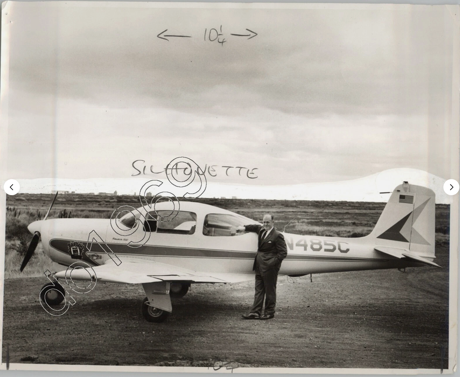 Gluckmann%20with%20Meyers%20200A%20aircraft%20with%20which%20he%20set%20round the world%20record%20copy